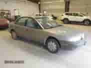 1999 Saturn SL with VIN 1G8ZF5287XZ157353, listed as a IAAI auction lot 42310900 with 372,049 mi miles and . Bid and sale history available at DreamBid. Image 1.