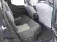 2024 Toyota Tacoma SR5 z VIN 3TMLB5JN5RM080565, wystawiony jako IAAI lot #42584677 z przebiegiem 17 149 mil mil oraz . Historia ofert i sprzedaży dostępna na DreamBid. Obrazek 8.