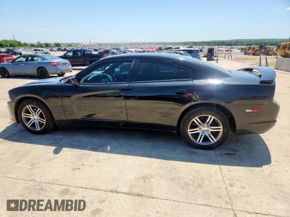 2013 Dodge Charger SXT z VIN 2C3CDXHG1DH502243, wystawiony jako Copart lot #60797055 z przebiegiem 105 632 mil mil oraz Szkoda całkowita • Salvage title. Historia ofert i sprzedaży dostępna na DreamBid. Obrazek 2.