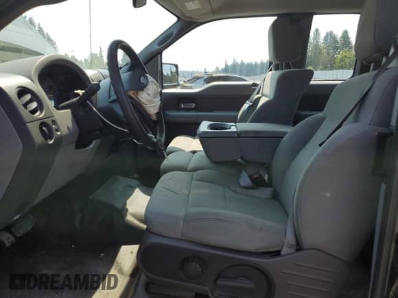 2008 Ford F-150 STX with VIN 1FTRX12W58FC04456, listed as a Copart auction lot 70501265 with 392,908 mi miles and Salvage title. Bid and sale history available at DreamBid. Image 7.