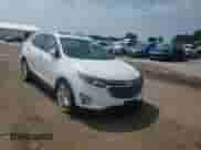 2018 Chevrolet Equinox Premier with VIN 2GNAXVEV1J6115823, listed as a Copart auction lot 69094645 with 106,508 mi miles and Salvage title. Bid and sale history available at DreamBid. Image 13.