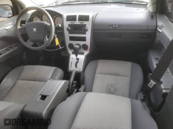 2008 Dodge Caliber SXT z VIN 1B3HB48B38D655284, wystawiony jako Copart lot #85874205 z przebiegiem 157 306 mil mil oraz Szkoda całkowita • Salvage title. Historia ofert i sprzedaży dostępna na DreamBid. Obrazek 8.