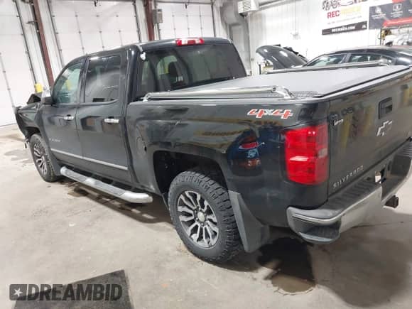 2014 Chevrolet Silverado 1500 LTZ with VIN 3GCUKSEC7EG359343, listed as a IAAI auction lot 42547326 with 164,151 mi miles and . Bid and sale history available at DreamBid. Image 3.