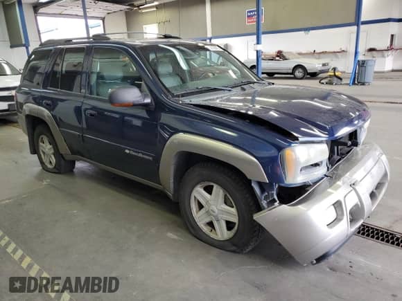 2003 Chevrolet TrailBlazer LTZ с VIN 1GNDT13S232157265, выставлен на аукционе Copart как лот 82138415 с пробегом 265 365 миль миль и Списание • Salvage title. История ставок и продаж доступна на DreamBid. Изображение 4.