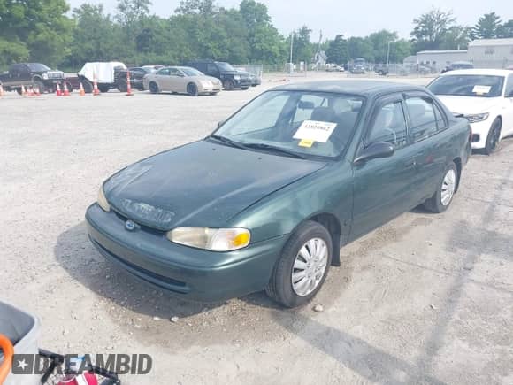 2002 Chevrolet Prizm with VIN 1Y1SK52812Z412988, listed as a IAAI auction lot 42824862 with 180,581 mi miles and . Bid and sale history available at DreamBid. Image 2.
