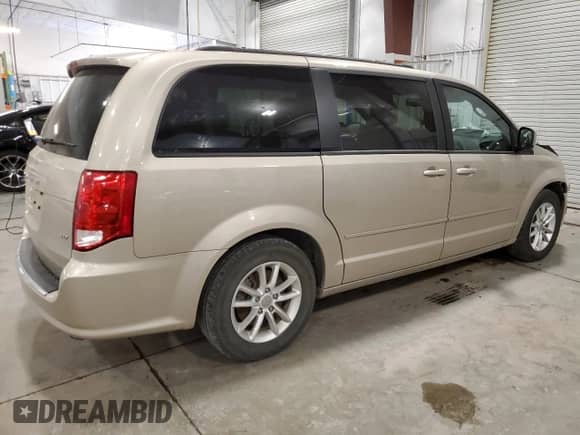 2016 Dodge Grand Caravan SXT с VIN 2C4RDGCG2GR210869, выставлен на аукционе Copart как лот 84391155 с пробегом 71 638 миль миль и Списание • Salvage title. История ставок и продаж доступна на DreamBid. Изображение 3.