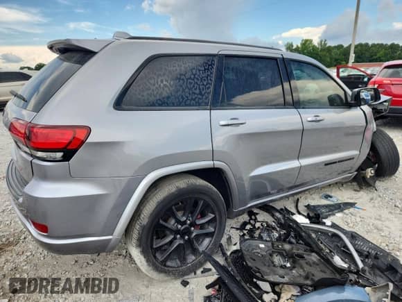 2018 Jeep Grand Cherokee Altitude with VIN 1C4RJEAG6JC275031, listed as a Copart auction lot 63568425 with Not provided miles and Salvage title. Bid and sale history available at DreamBid. Image 3.