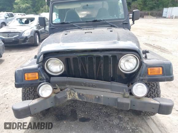 2001 Jeep Wrangler Sahara z VIN 1J4FA59S41P358035, wystawiony jako IAAI lot #42685488 z przebiegiem 120 630 mil mil oraz . Historia ofert i sprzedaży dostępna na DreamBid. Obrazek 6.