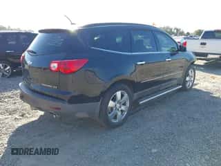 2012 Chevrolet Traverse LTZ z VIN 1GNKRLED9CJ330785, wystawiony jako IAAI lot #43334080 z przebiegiem 123 087 mil mil oraz . Historia ofert i sprzedaży dostępna na DreamBid. Obrazek 4.