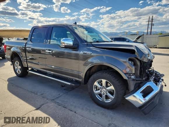 2018 Ford F-150 XLT z VIN 1FTEW1EG1JKC82476, wystawiony jako Copart lot #82260715 z przebiegiem 62 114 mil mil oraz Szkoda całkowita • Salvage title. Historia ofert i sprzedaży dostępna na DreamBid. Obrazek 4.