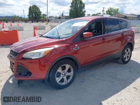 2014 Ford Escape SE with VIN 1FMCU0GX5EUC16474, listed as a IAAI auction lot 40276119 with 112,714 mi miles and . Bid and sale history available at DreamBid. Image 2.