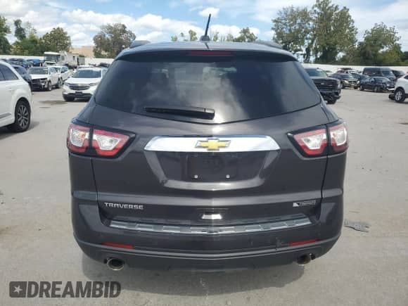 2017 Chevrolet Traverse Premier z VIN 1GNKRJKDXHJ151767, wystawiony jako Copart lot #70535695 z przebiegiem Nie podano mil oraz Czysty tytuł • Clean title. Historia ofert i sprzedaży dostępna na DreamBid. Obrazek 6.