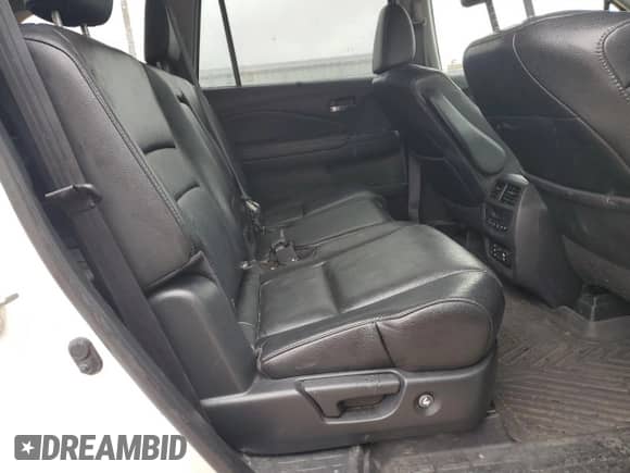 2018 Honda Pilot Touring z VIN 5FNYF5H92JB009576, wystawiony jako Copart lot #64393635 z przebiegiem 101 546 mil mil oraz Szkoda całkowita • Salvage title. Historia ofert i sprzedaży dostępna na DreamBid. Obrazek 11.