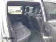 2022 Toyota Tacoma Limited with VIN 3TMGZ5AN2NM504615, listed as a IAAI auction lot 42261699 with 58,141 mi miles and . Bid and sale history available at DreamBid. Image 8.