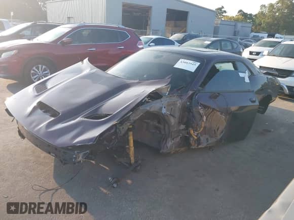 2022 Dodge Challenger R/T Scat Pack Widebody z VIN 2C3CDZFJ6NH156377, wystawiony jako IAAI lot #43003945 z przebiegiem 9 mil mil oraz . Historia ofert i sprzedaży dostępna na DreamBid. Obrazek 17.