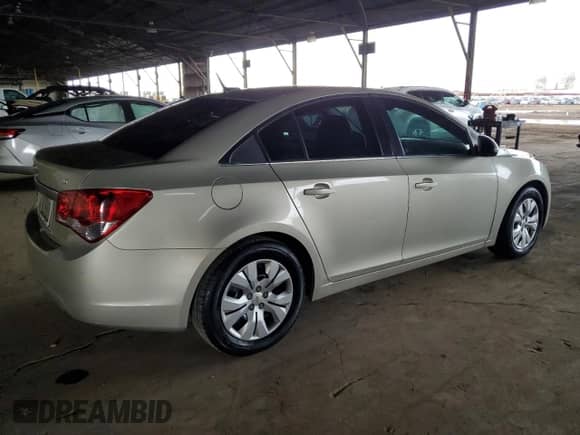 2013 Chevrolet Cruze 1LT z VIN 1G1PC5SBXD7233035, wystawiony jako Copart lot #86688455 z przebiegiem 159 523 mil mil oraz Czysty tytuł • Clean title. Historia ofert i sprzedaży dostępna na DreamBid. Obrazek 3.