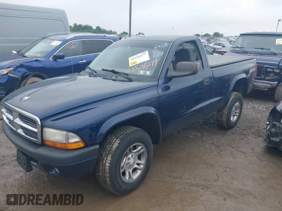 2004 Dodge Dakota with VIN 1D7GG36KX4S596268, listed as a IAAI auction lot 42535177 with 60,497 mi miles and . Bid and sale history available at DreamBid. Image 2.