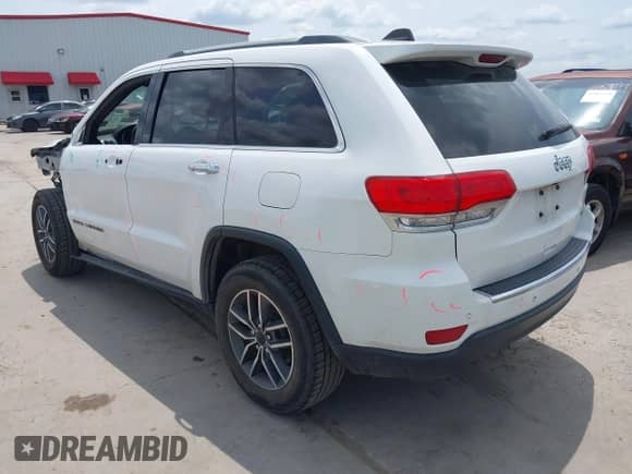 2018 Jeep Grand Cherokee Sterling with VIN 1C4RJEBG0JC304599, listed as a IAAI auction lot 42394600 with 124,955 mi miles and . Bid and sale history available at DreamBid. Image 3.