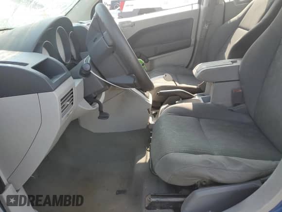 2007 Dodge Caliber z VIN 1B3HB28C37D582199, wystawiony jako Copart lot #63773794 z przebiegiem 207 780 mil mil oraz Czysty tytuł • Clean title. Historia ofert i sprzedaży dostępna na DreamBid. Obrazek 7.