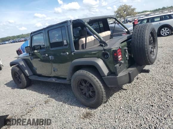 2008 Jeep Wrangler Unlimited X с VIN 1J4GB39108L608465, выставлен на аукционе Copart как лот 50949015 с пробегом 103 205 миль миль и Списание • Salvage title. История ставок и продаж доступна на DreamBid. Изображение 2.