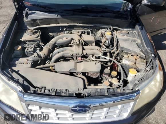 2013 Subaru Forester X z VIN JF2SHABC7DH413671, wystawiony jako Copart lot #84881225 z przebiegiem 204 155 mil mil oraz Szkoda całkowita • Salvage title. Historia ofert i sprzedaży dostępna na DreamBid. Obrazek 11.