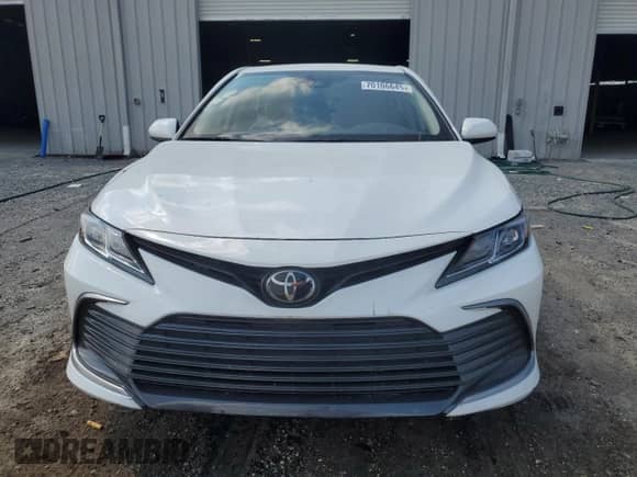 2023 Toyota Camry LE z VIN 4T1C11AK8PU827730, wystawiony jako Copart lot #70106645 z przebiegiem Nie podano mil oraz Czysty tytuł • Clean title. Historia ofert i sprzedaży dostępna na DreamBid. Obrazek 5.