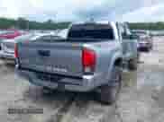 2019 Toyota Tacoma SR z VIN 3TMCZ5AN8KM287646, wystawiony jako IAAI lot #42969397 z przebiegiem 100 562 mil mil oraz . Historia ofert i sprzedaży dostępna na DreamBid. Obrazek 4.