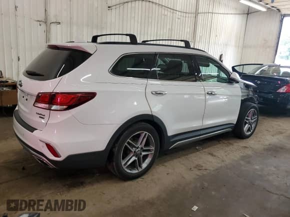 2017 Hyundai Santa Fe SE Ultimate с VIN KM8SR4HFXHU217652, выставлен на аукционе Copart как лот 69274595 с пробегом 111 109 миль миль и Списание • Salvage title. История ставок и продаж доступна на DreamBid. Изображение 3.