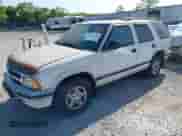 1997 Chevrolet Blazer LS with VIN 1GNDT13W4V2100457, listed as a IAAI auction lot 42380343 with 122,503 mi miles and . Bid and sale history available at DreamBid. Image 2.