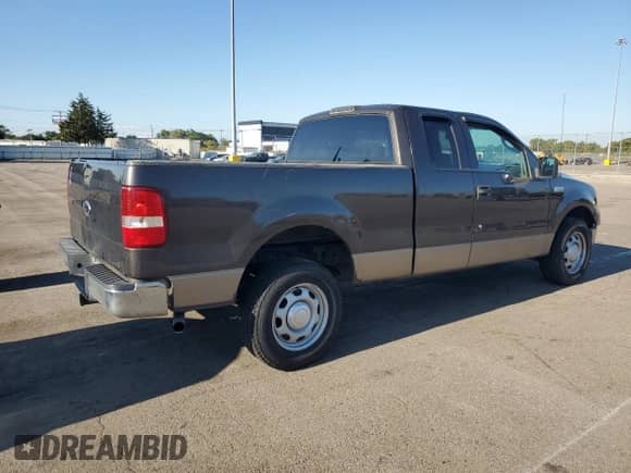 2005 Ford F-150 XLT with VIN 1FTPX12595FA06845, listed as a Copart auction lot 70637355 with 239,977 mi miles and Clean title. Bid and sale history available at DreamBid. Image 3.