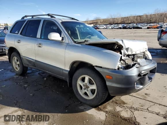 2002 Hyundai Santa Fe GLS с VIN KM8SC13D02U311312, выставлен на аукционе Copart как лот 85943534 с пробегом 307 758 миль миль и Списание • Salvage title. История ставок и продаж доступна на DreamBid. Изображение 4.