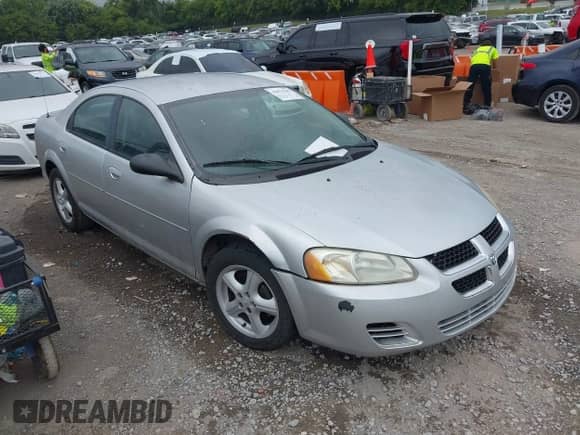 2005 Dodge Stratus SXT with VIN 1B3EL46TX5N676005, listed as a IAAI auction lot 42876282 with 171,952 mi miles and . Bid and sale history available at DreamBid. Image 1.