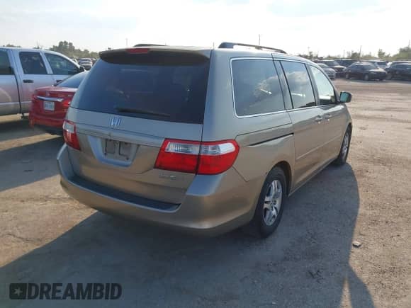 2005 Honda Odyssey EX z VIN 5FNRL38465B044990, wystawiony jako IAAI lot #43334598 z przebiegiem 177 732 mil mil oraz . Historia ofert i sprzedaży dostępna na DreamBid. Obrazek 4.