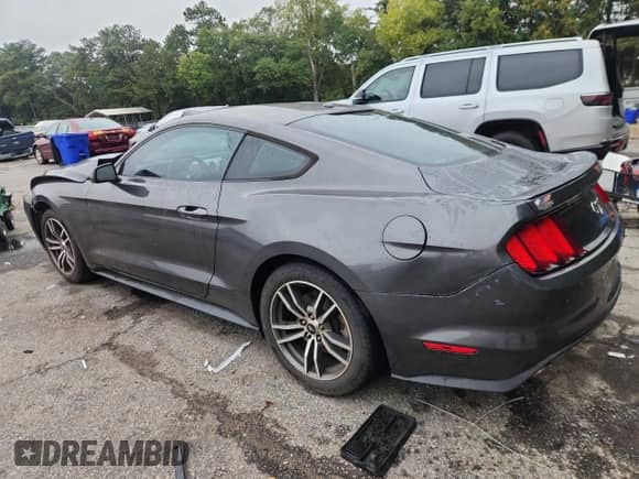 2016 Ford Mustang EcoBoost Premium with VIN 1FA6P8TH9G5337128, listed as a Copart auction lot 84031595 with 96,848 mi miles and Salvage title. Bid and sale history available at DreamBid. Image 2.