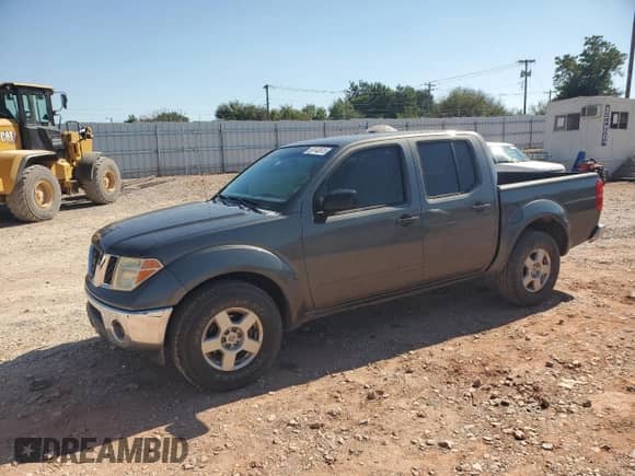 2008 Nissan Frontier SE with VIN 1N6AD07U38C443767, listed as a Copart auction lot 86143615 with 144,218 mi miles and Salvage title. Bid and sale history available at DreamBid. Image 1.