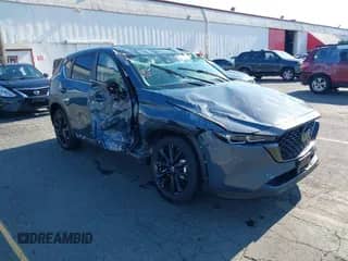 2025 Mazda CX-5 S Carbon Edition z VIN JM3KFBCM0S0575730, wystawiony jako IAAI lot #42685414 z przebiegiem Nie podano mil oraz . Historia ofert i sprzedaży dostępna na DreamBid. Obrazek 1.