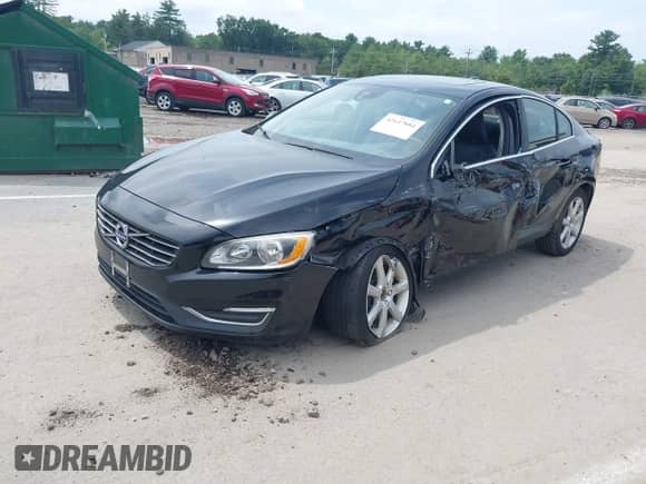 2016 Volvo S60 T5 Drive-E Premier z VIN YV126MFKXG2390847, wystawiony jako IAAI lot #42647884 z przebiegiem 115 397 mil mil oraz . Historia ofert i sprzedaży dostępna na DreamBid. Obrazek 2.