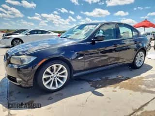 2011 BMW 3 Series 328i with VIN WBAPH7G57BNM57523, listed as a Copart auction lot 69054785 with 202,761 mi miles and Salvage title. Bid and sale history available at DreamBid. Image 1.