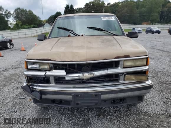 1995 Chevrolet Tahoe z VIN 1GNEK13K2SJ439871, wystawiony jako Copart lot #73173034 z przebiegiem 274 829 mil mil oraz Szkoda całkowita • Salvage title. Historia ofert i sprzedaży dostępna na DreamBid. Obrazek 5.