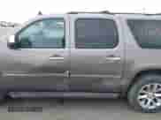 2014 Chevrolet Suburban LTZ with VIN 1GNSKKE77ER152503, listed as a IAAI auction lot 42105720 with 152,767 mi miles and . Bid and sale history available at DreamBid. Image 14.