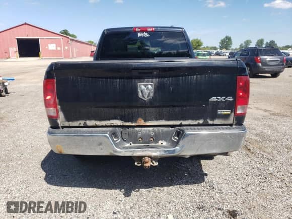 2012 Ram 1500 ST z VIN 1C6RD7FP4CS120411, wystawiony jako Copart lot #69358175 z przebiegiem 381 890 mil mil oraz Szkoda całkowita • Salvage title. Historia ofert i sprzedaży dostępna na DreamBid. Obrazek 6.