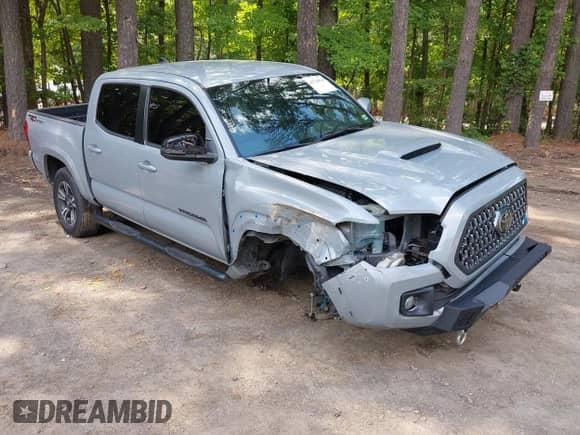 2019 Toyota Tacoma SR5 z VIN 3TMAZ5CN1KM113843, wystawiony jako IAAI lot #42716836 z przebiegiem 43 164 mil mil oraz . Historia ofert i sprzedaży dostępna na DreamBid. Obrazek 1.