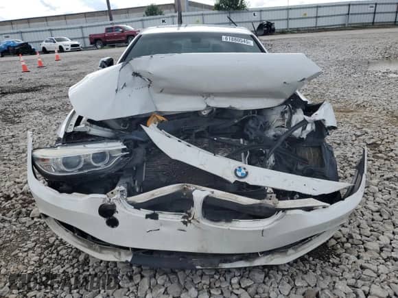 2015 BMW 4 Series 428i xDrive z VIN WBA4A7C53FD415066, wystawiony jako Copart lot #61880545 z przebiegiem 130 874 mil mil oraz Szkoda całkowita • Salvage title. Historia ofert i sprzedaży dostępna na DreamBid. Obrazek 5.