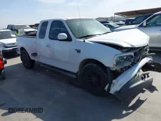 2003 Ford F-150 XL with VIN 1FTRX07L83KB50711, listed as a IAAI auction lot 41832990 with 201,328 mi miles and . Bid and sale history available at DreamBid. Image 1.