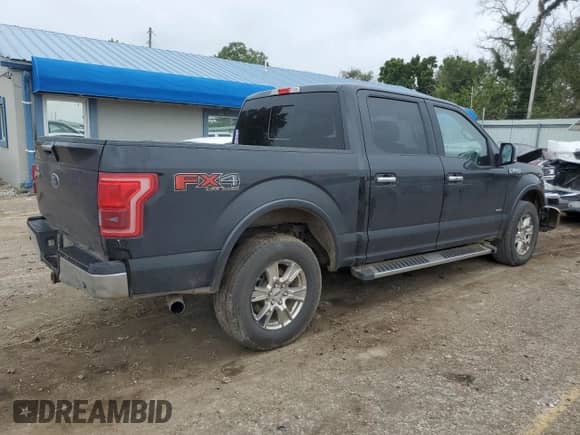 2015 Ford F-150 XLT с VIN 1FTEW1EGXFKD26997, выставлен на аукционе Copart как лот 70689925 с пробегом 216 252 миль миль и Списание • Salvage title. История ставок и продаж доступна на DreamBid. Изображение 3.