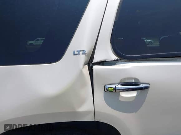 2008 Chevrolet Tahoe LTZ with VIN 1GNFC13J38R248270, listed as a IAAI auction lot 42403526 with 216,031 mi miles and . Bid and sale history available at DreamBid. Image 12.