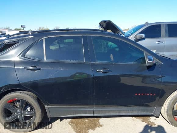 2023 Chevrolet Equinox Premier with VIN 3GNAXNEG8PL240694, listed as a IAAI auction lot 41212275 with 28,134 mi miles and . Bid and sale history available at DreamBid. Image 13.