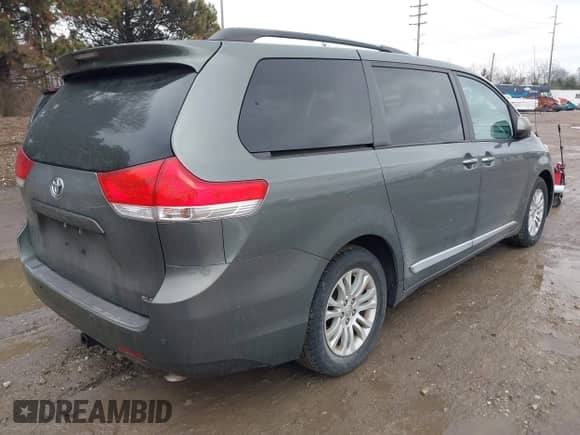 2013 Toyota Sienna XLE AAS with VIN 5TDYK3DC8DS375852, listed as a IAAI auction lot 41519437 with 91,828 mi miles and . Bid and sale history available at DreamBid. Image 4.