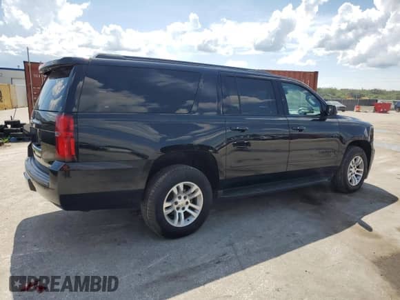 2019 Chevrolet Suburban Premier with VIN 1GNSKJKJ4KR131551, listed as a Copart auction lot 60237595 with 132,270 mi miles and Salvage title. Bid and sale history available at DreamBid. Image 3.