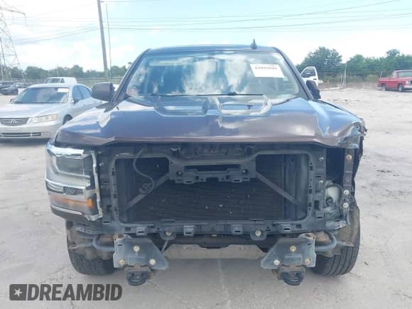 2016 Chevrolet Silverado 1500 LT z VIN 1GCVKREC6GZ221485, wystawiony jako IAAI lot #42993049 z przebiegiem 145 488 mil mil oraz . Historia ofert i sprzedaży dostępna na DreamBid. Obrazek 13.